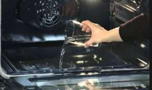 Easy Way for Self-Cleaning your Samsung Oven - Guide 2022 Fill the Steam Clean pan halfway